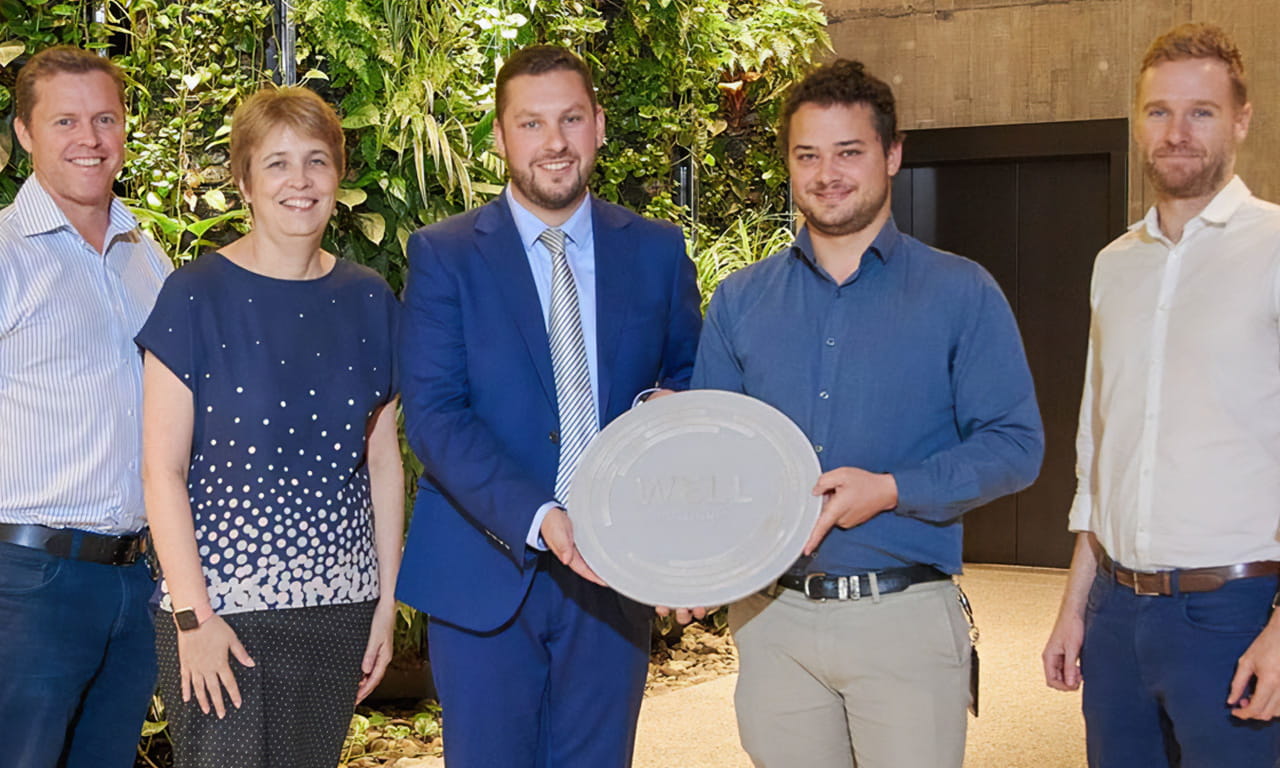 Jack Noonan from the IWBI presenting the Platinum WELL Core and Shell Certification to the Aurecon.