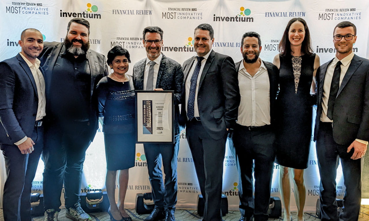 Aurecon celebrates ranking 5th in Professional Services at the 2022 AFR BOSS Most Innovative Companies award night. L-R: Daniel San Martin, Dave Mackenzie, Sue Boyce (Ability Works), Andrew Maher, Angus Leitch, Stewart Bird, Hester De Wet, Jake Gerrard.