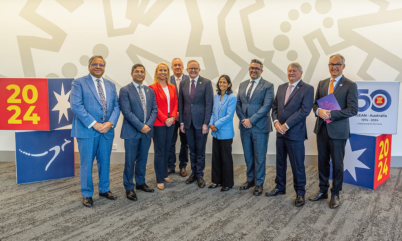 Louise Adams stands to the left of Anthony Albanese MP (C), Prime Minister of Australia with business leaders for a photo during the CEO Lunch at the ASEAN-Australia Special Summit 2024. Photograph by Steve Christo/ASEAN