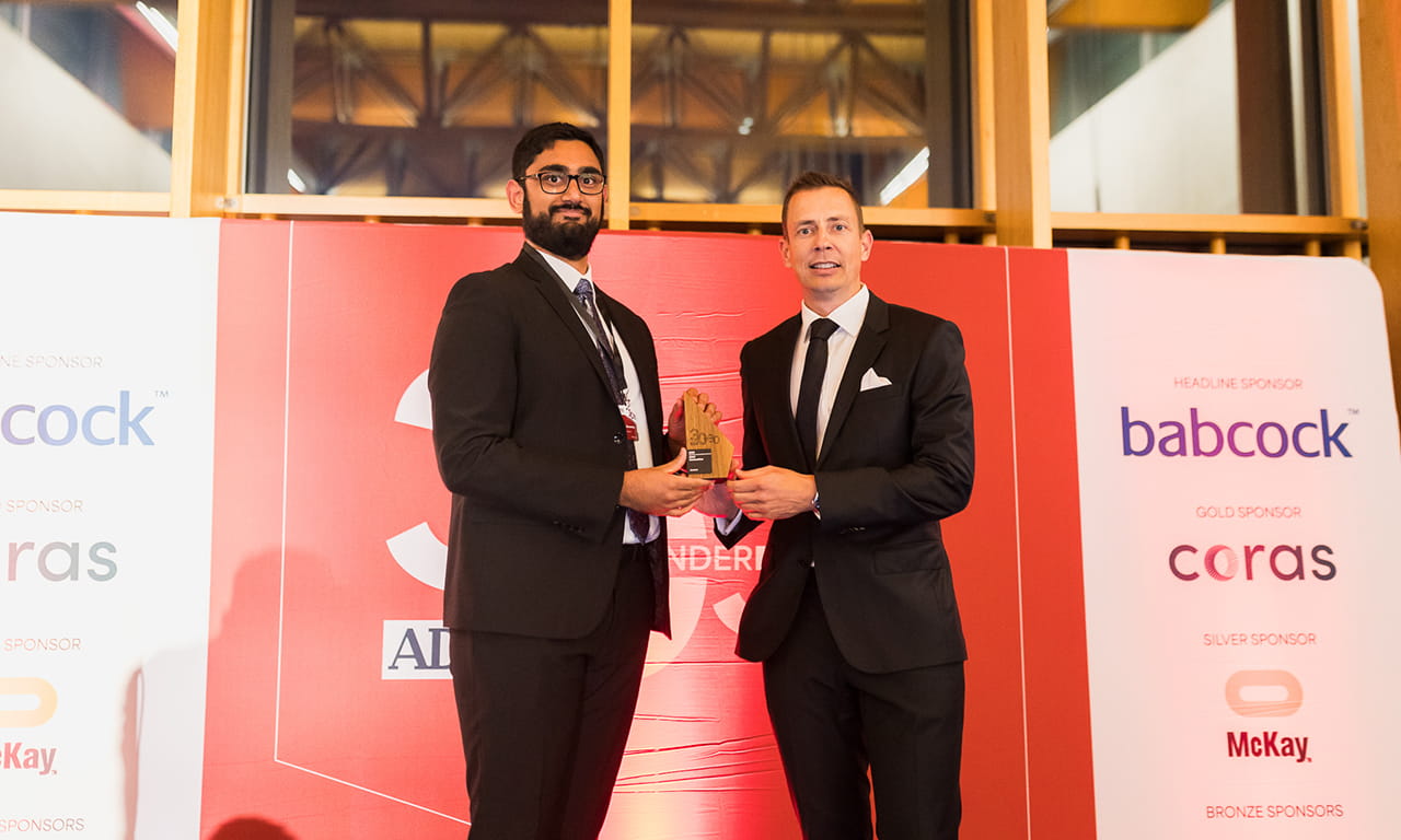 Aurecon’s Nikhil Ramanathan receiving his Team Leadership Award in Canberra. Image courtesy of ADM. 