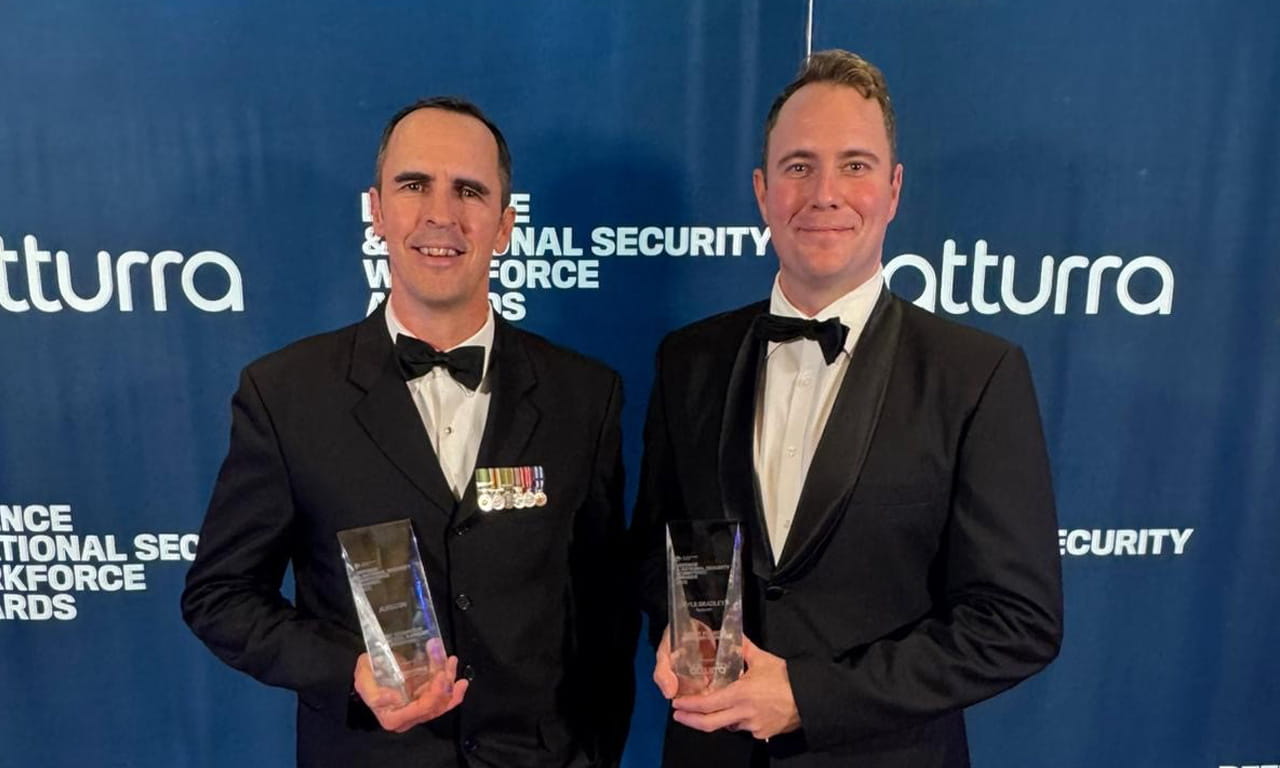 David Patterson and Kyle Bradley with the award trophies at the Defence & National Security Workforce Awards 2025.