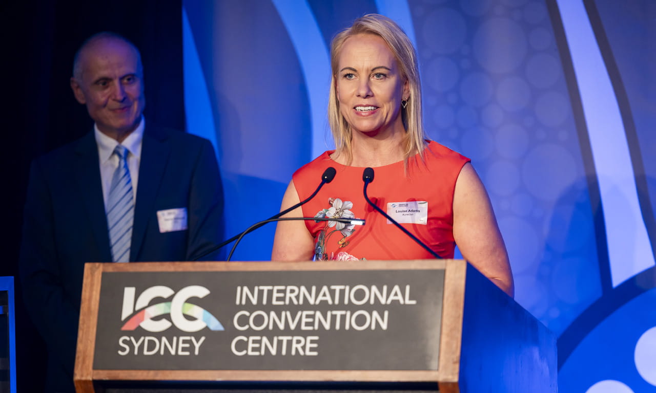 Incoming CEO Louise Adams accepting President’s Award and Champion of Change Award on behalf of Aurecon’s CEO, William (Bill) Cox.