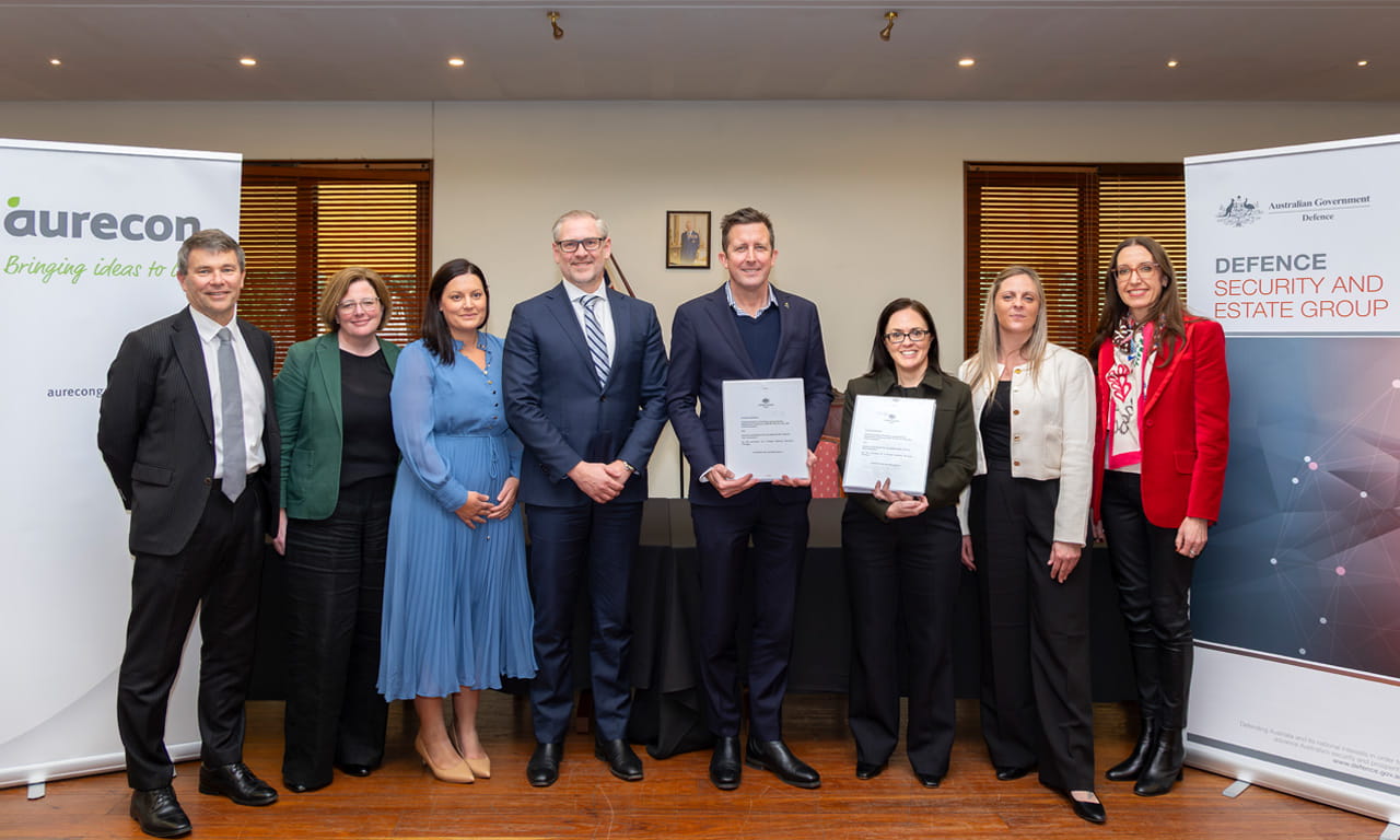 All attendees at Duntroon House, Canberra for PDS contract signing for Defence Estate Work Program. L-R: Damon Howes (Aurecon); Kristian Wheeler (Aurecon); Julieanne Birt (Aurecon); Scott Powell (Aurecon); Todd Battley (Aurecon); Lee-Anne Monterosso (Department of Defence); Temilya Broderick (Department of Defence); Andrea Nejedlik (Aurecon).