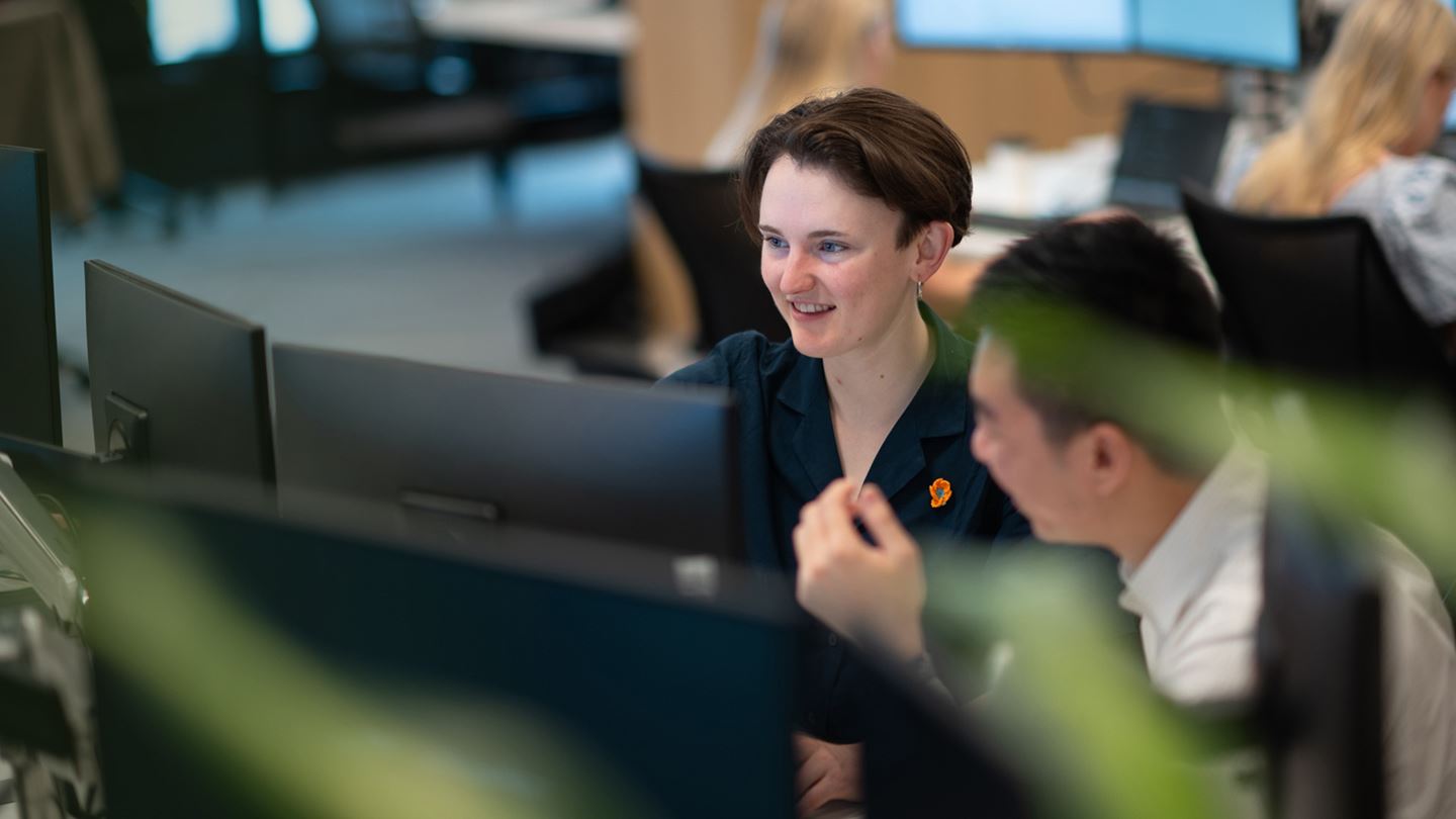Aurecon's Meaghan Ferguson collaborating with team at Melbourne office.