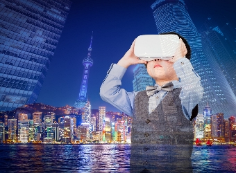 Young boy viewing the world through virtual reality googles