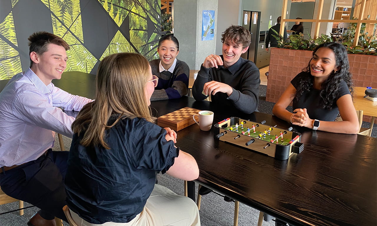 Graduates getting to know each other in our our Tāmaki Makaurau office. 