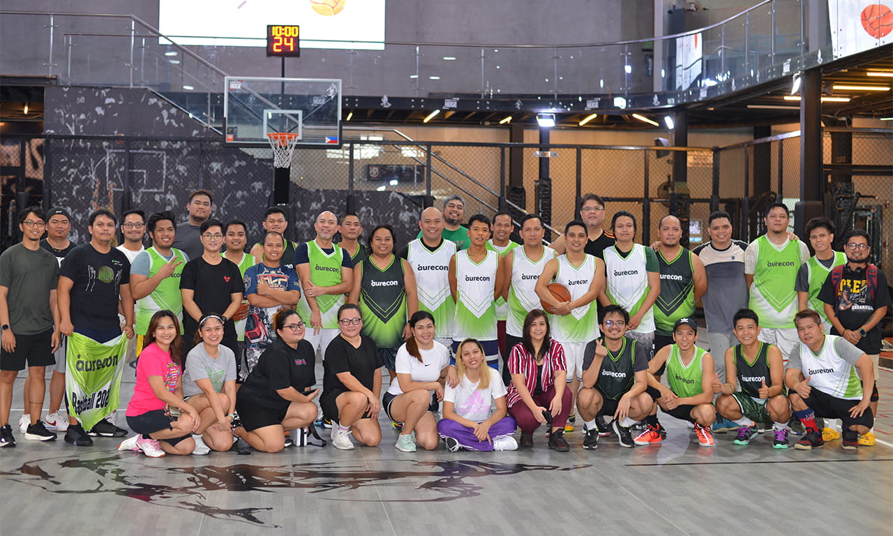 The corporate basketball team end of season photo.