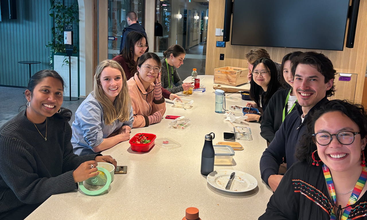 Sarah having lunch in the Melbourne office with some of her team and other interns.