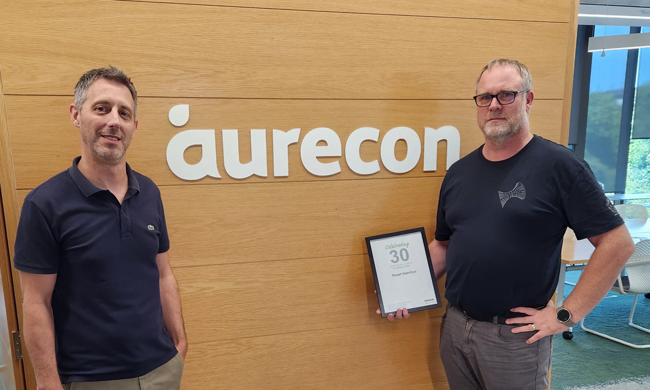Celebrating 30 years at Aurecon, Stuart Hamilton with New Zealand's Roads Practice Leader, Martyn Francis.