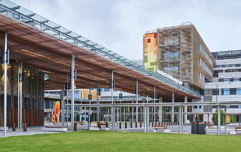 A view of the main entry to the building, cantilevering a four storey block over the entrance.