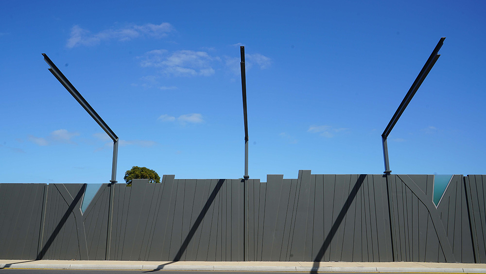 Walls that are between 3 – 3.5m high were erected to reduce the sound pollution from construction.