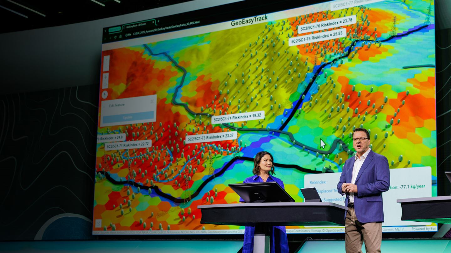 Aurecon's Martin Russell, Director, Environment & Planning and Em Tantau, Senior IT Manager demonstrate the power of GeoEasyTrack© at the 2025 Esri User Conference.