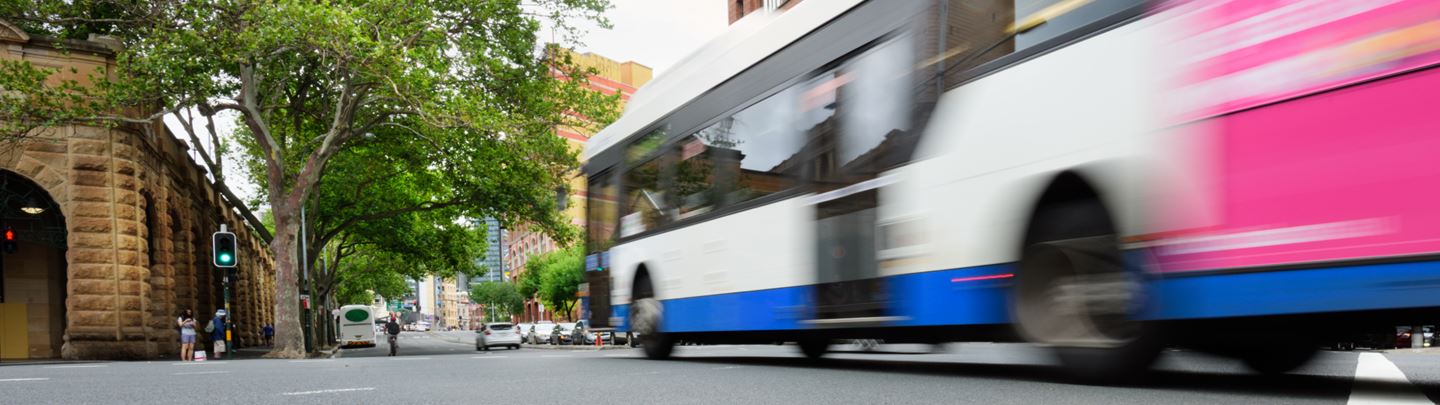 Bus driving through Sydney.