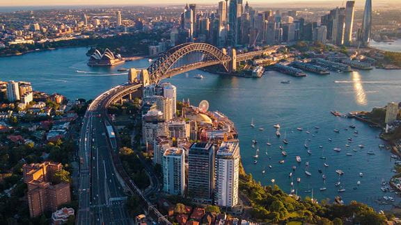 Aerial drone view of Sydney City and Sydney Harbour showing Sydney Harbour Bridge and Lavender Bay.