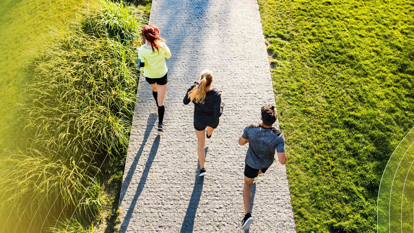 3 people running up a path | Aurecon