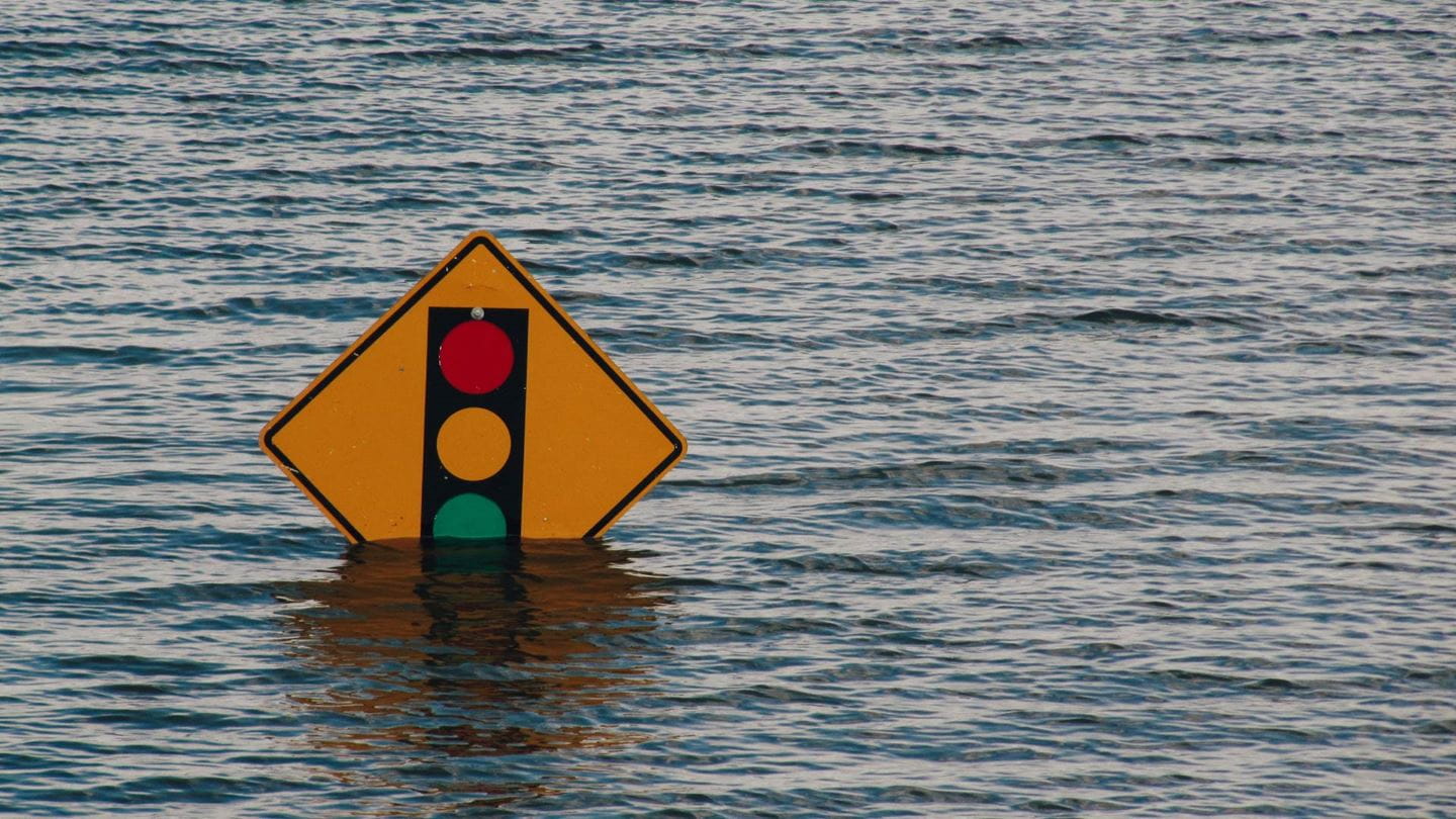 Traffic light sign submerged in flood