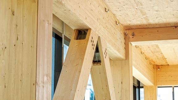 MET Engineered timber used in supporting structure of building.