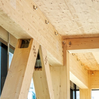 MET Engineered timber used in supporting structure of building.