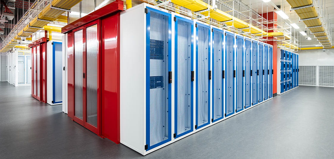 The lower data halls were built and operational for NEXTDC customers, while the upper floors were still under construction.