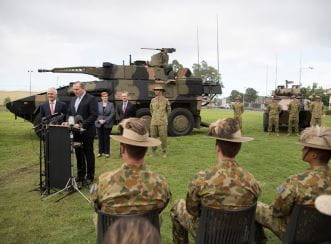 Mr. Ben Hudson, Global Head Vehicle Systems Division, Rheinmetall Defence, The Hon Malcolm Turnbull, MP, Prime Minister of Australia, Minister for Defence Senator the Hon Marise Payne, Minister for Defence Industry The Hon Christopher Pyne MP and Chief of Army, Lieutenant General Angus Campbell, AO, DSC at the announcement of Project LAND 400 Phase 2 where Defence will acquire 211 Rheinmetall Boxer Combat Reconnaissance Vehicles (CRV) to replace the Australian Light Armoured Vehicle (ASLAV). Image courtesy of Australian Government Department of Defence.