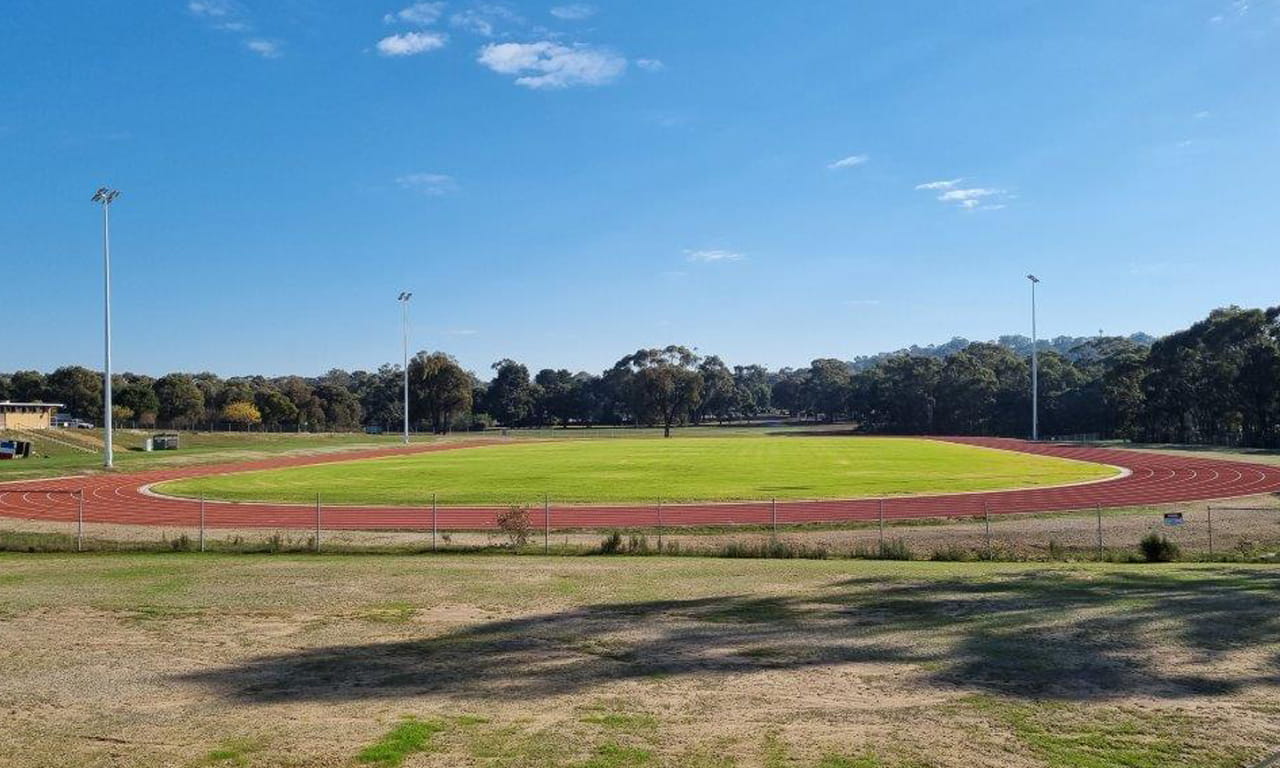 The full athletics track with lighting.