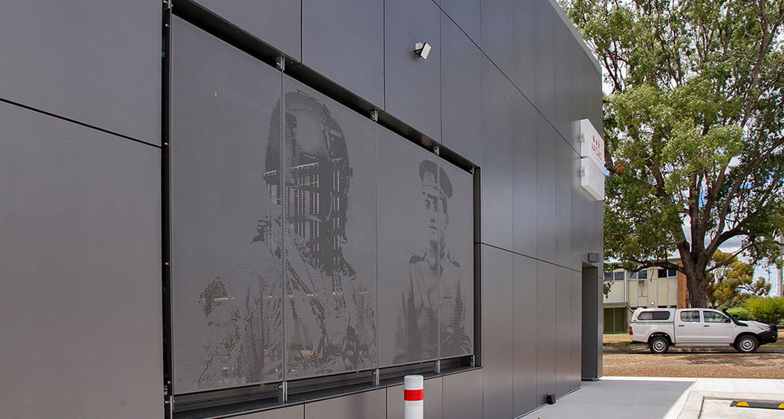 The mural in the old commercial centre sits in a prominent position in the new centre, providing a sentimental link to the base’s history.