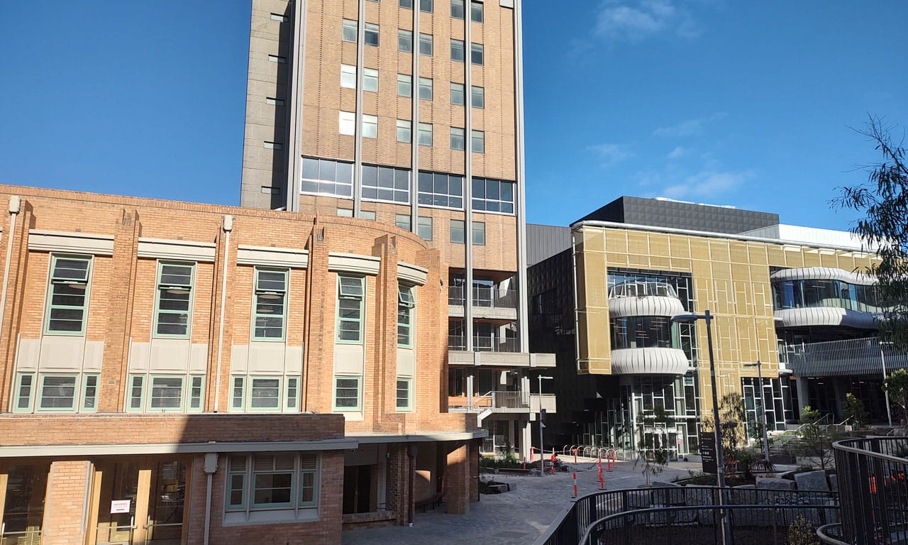 Refurbished Building 189 in the foreground, followed by Building 168, then the new, Arts and Cultural Building.