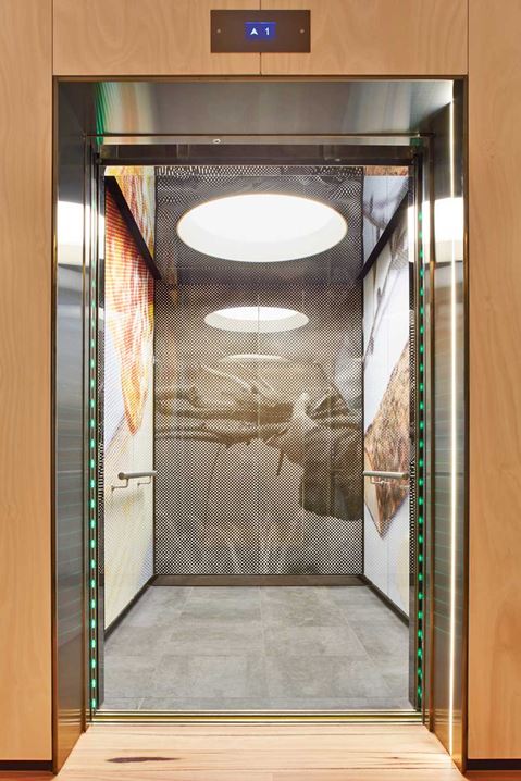 The interior of the Chancellery has a mid-century and layering of imagery on the walls. Image courtesy of Rhiannon Slatter.