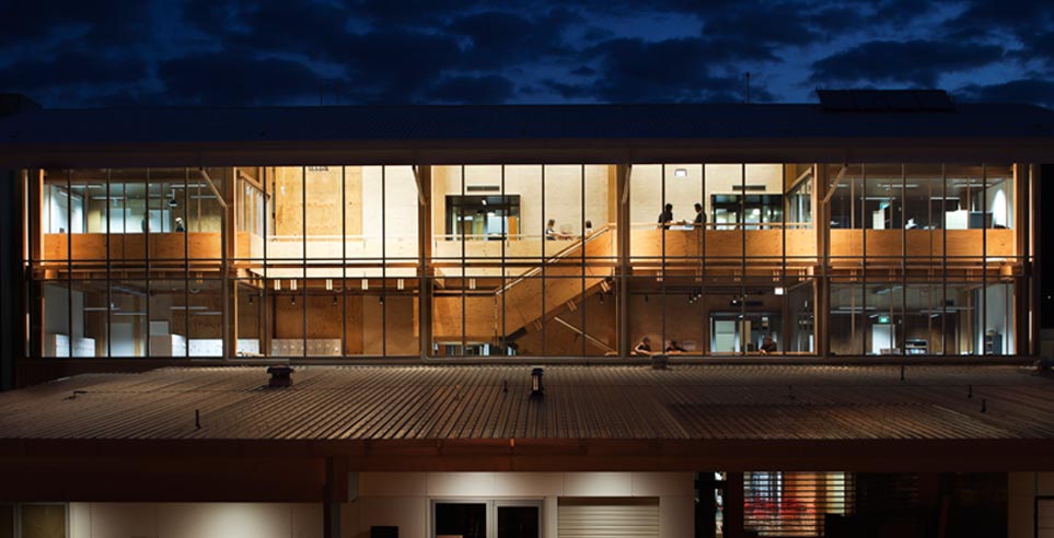 Night time exterior view of the Nelson Marlborough Institute of Technology Arts and Media building.
