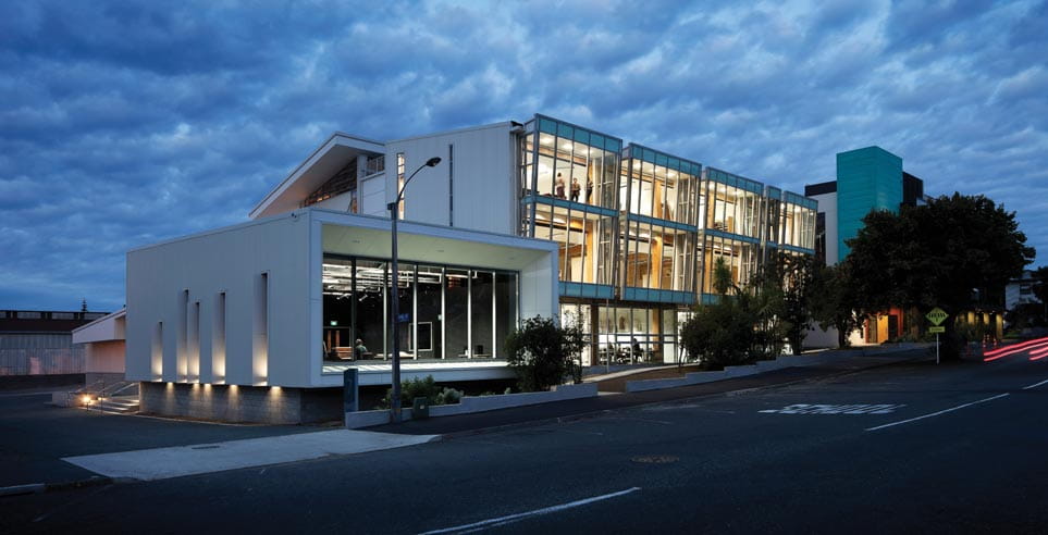 Exterior view at night of the Nelson Marlborough Institute of Technology Arts and Media building.