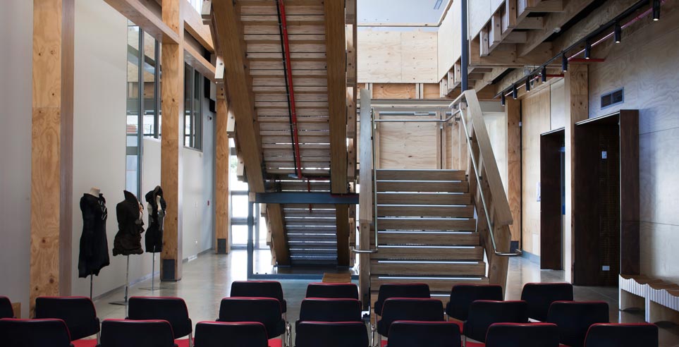 Ground floor view of one of the timber staircases found throughout the Nelson Marlborough Institute of Technology Arts and Media building.