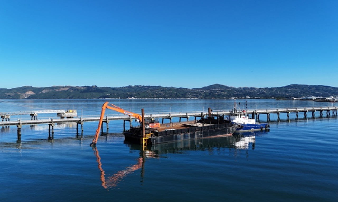 The project involves dredging operations to clear sediment from shipping channels.