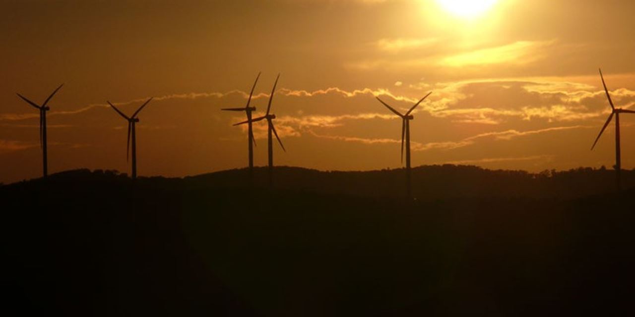 The green energy produced by the Woodlawn Wind Farm will be enough to power Australian households and represents a saving of greenhouse gases.