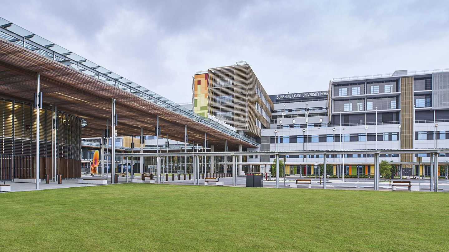 A view of the main entry to the building, cantilevering a four storey block over the entrance. Image courtesy of Lendlease Building.