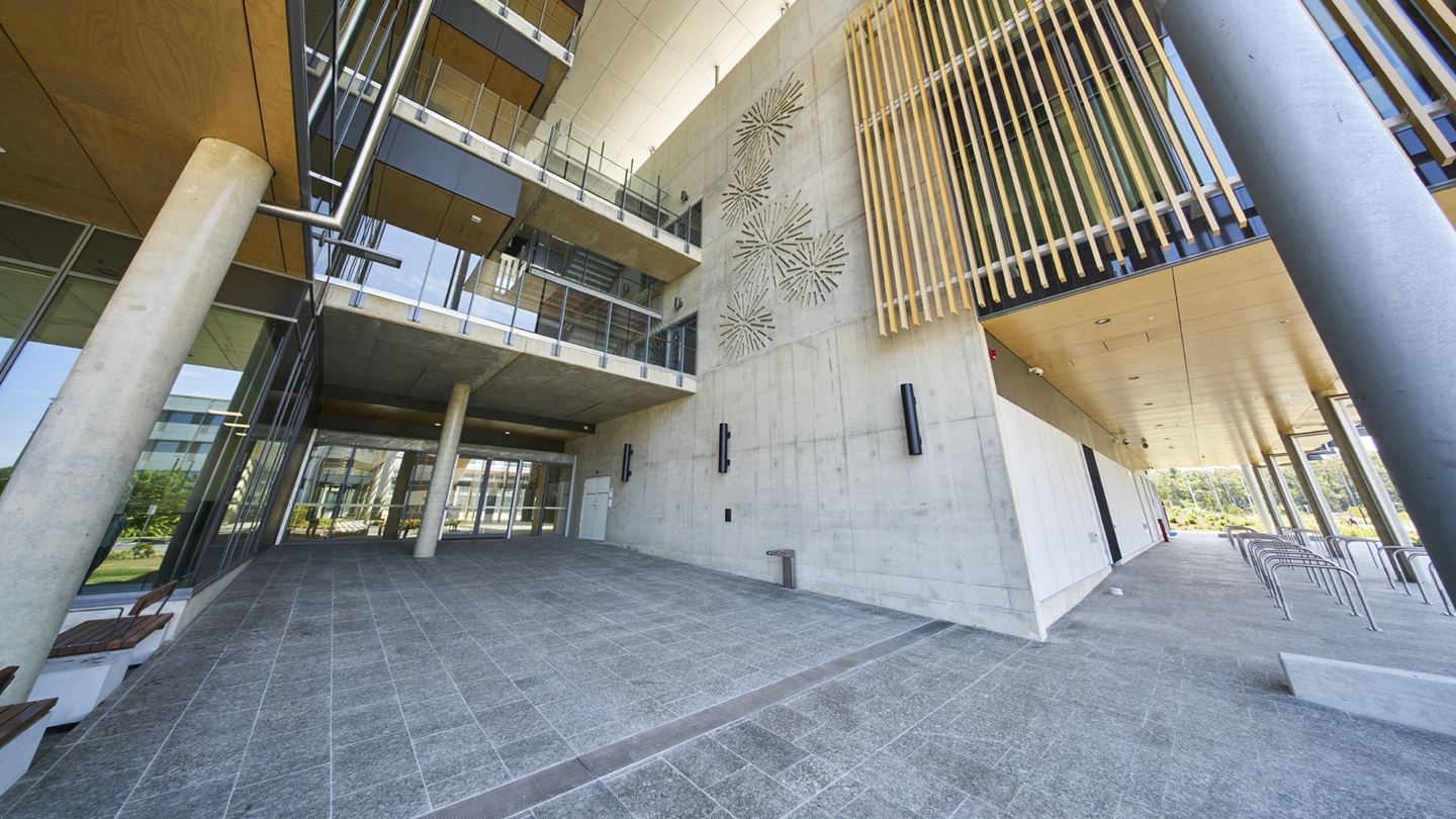 Light filled entrance Sunshine Coast University Hospital with balconies rising up to overlook the external landscape. Image courtesy of Lendlease Building.