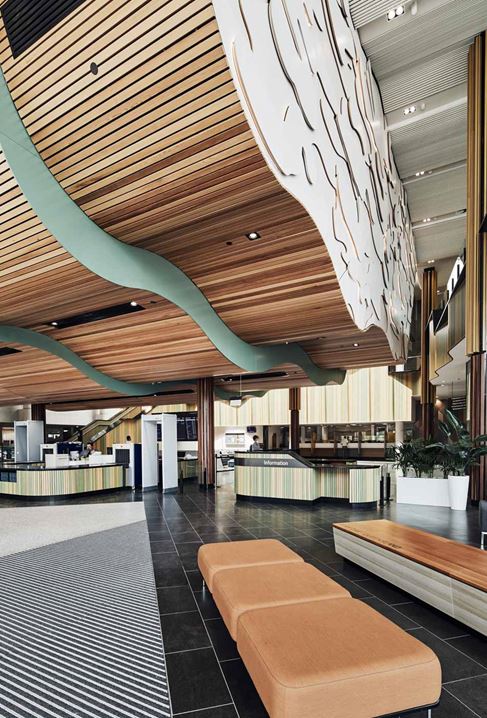 The open space between the original two buildings is now connected by a large atrium forming a new public entrance and registry area.