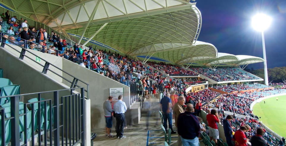 A view of fans enjoying a night at the Adelaide Oval - Western Grandstand.