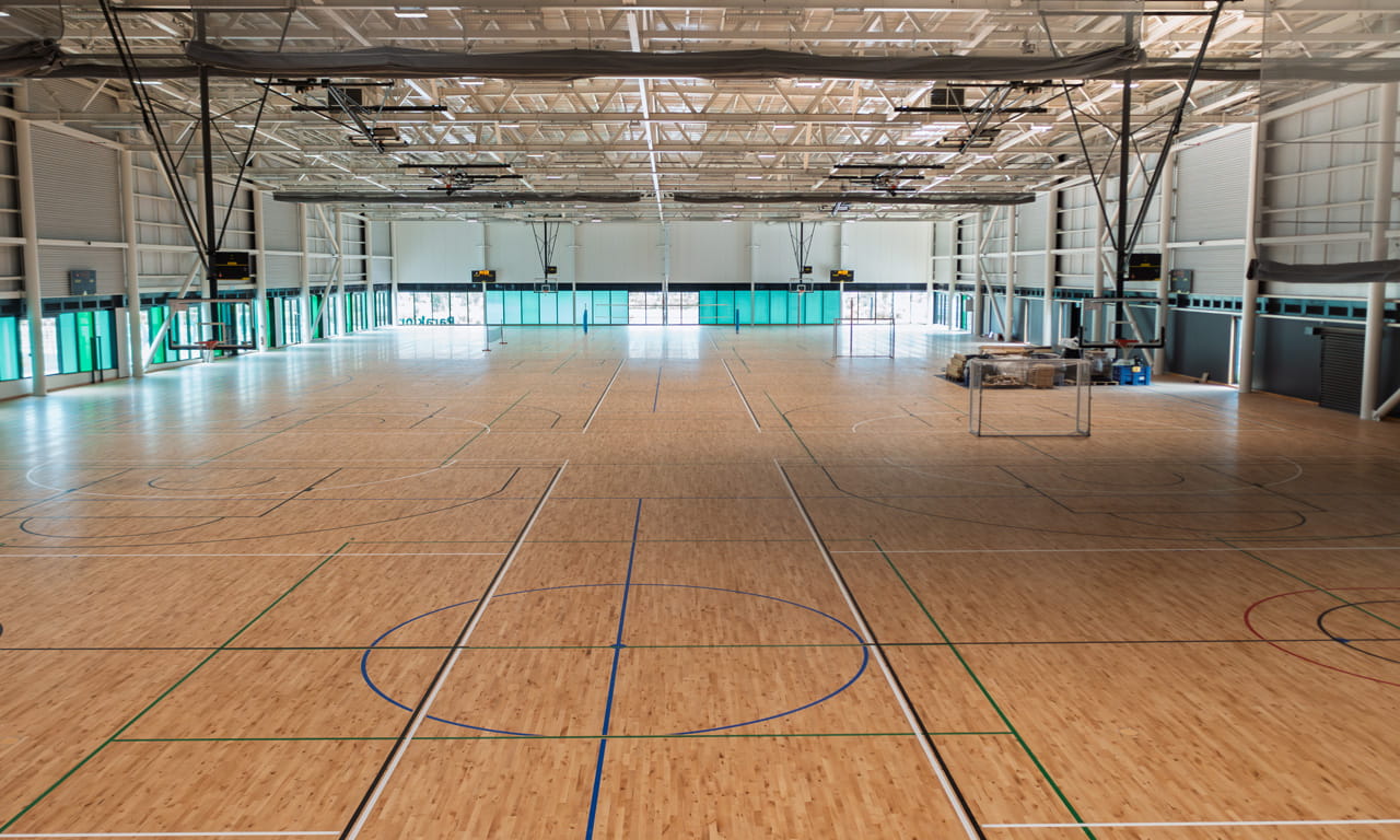 Parakiore's Show Courts use high-quality, sprung timber system designed to reduce impact on players' joints.