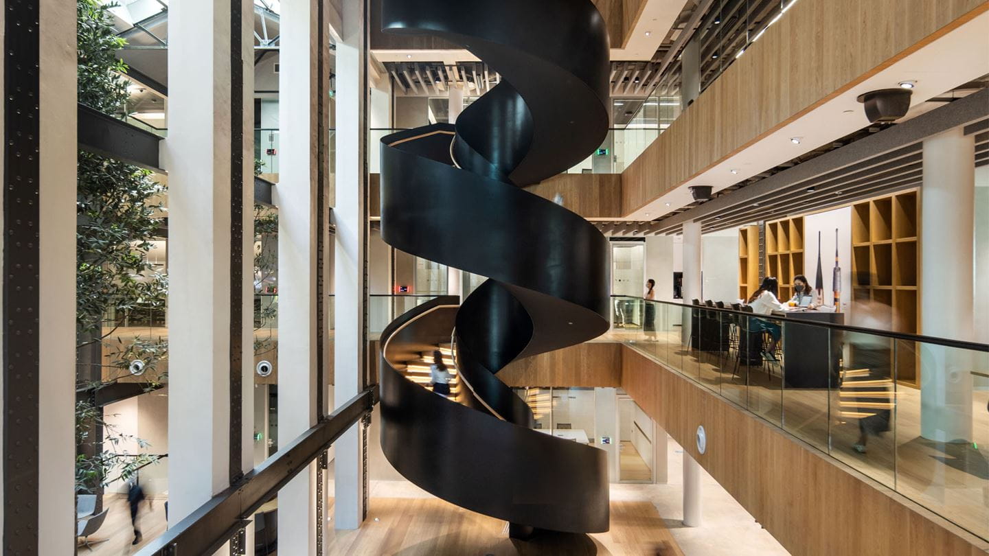 Aurecon's building design services included the free-standing spiral staircase that was analysed and designed as a single core and sits at the centre of Dyson's headquarters.