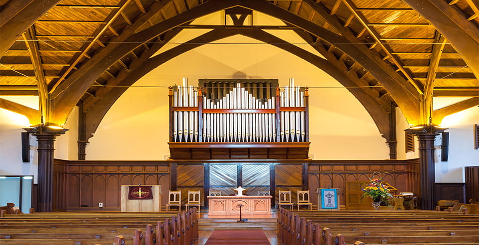 Knox Church is a prominent historic Christchurch building built in 1902 and features an ornate timber roof structure supported on timber columns.