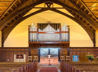 Knox Church is a prominent historic Christchurch building built in 1902 and features an ornate timber roof structure supported on timber columns.