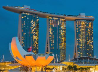 Marina Bay outdoor light and water show are one of Singapore’s most vibrant and bustling spots at night. Image courtesy of Julien de Salaberry via Unsplash