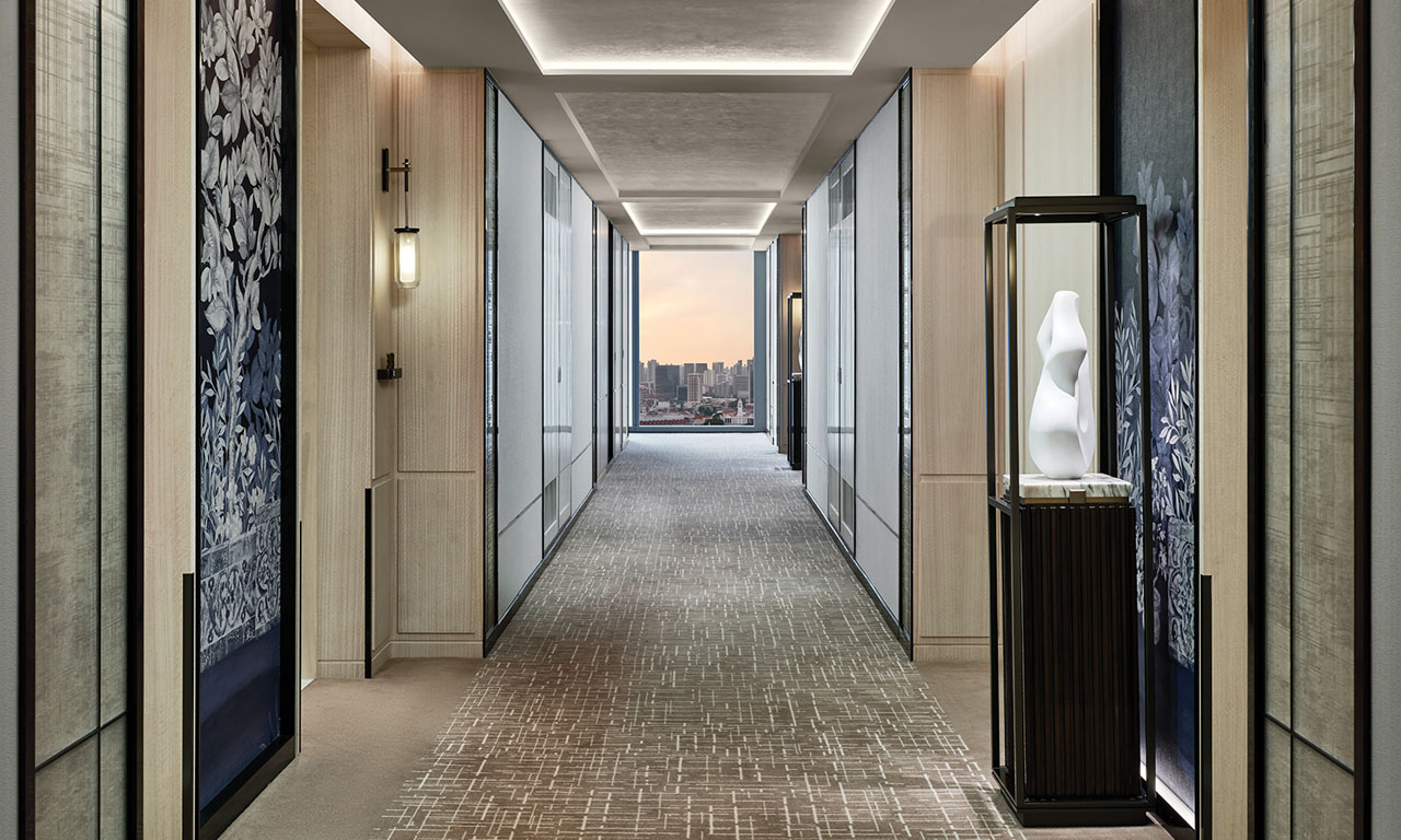 The corridor is embellished with details of the tropical garden city. Image courtesy of Marina Bay Sands.