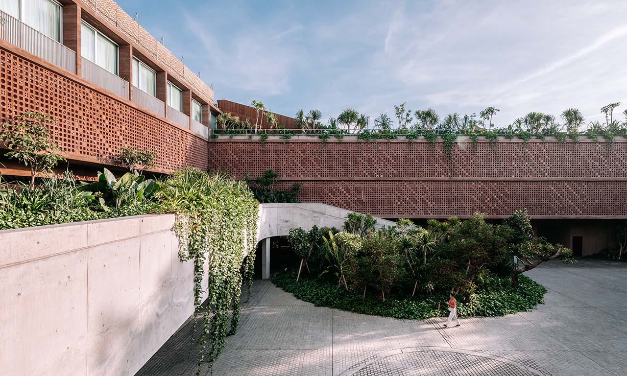 A wide angle view of the courtyard at Potato Head Studios. Image courtesy of OMA. Photo credit Kevin Mak. 