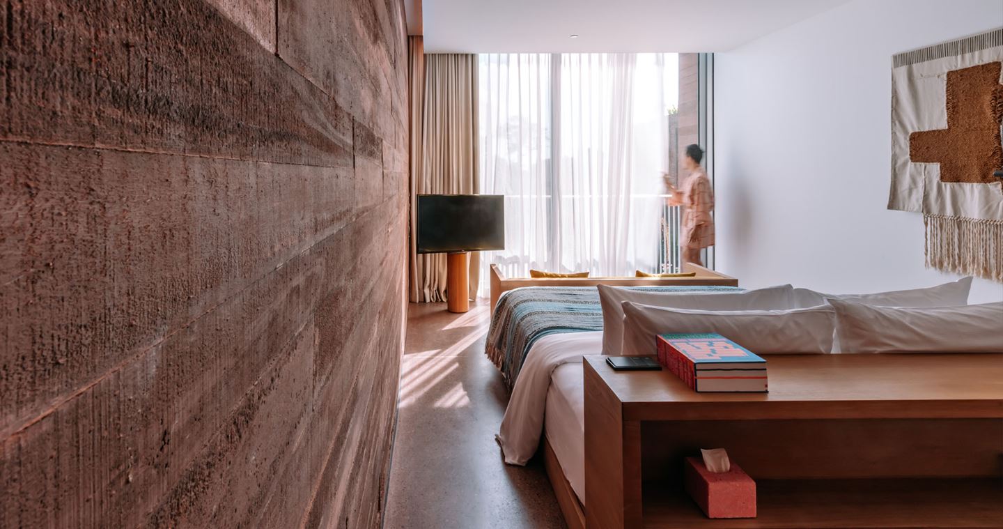One of the guest rooms at Potato Head Studios. Image courtesy of OMA, Kevin Mak.