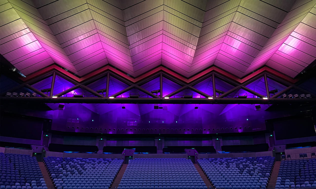The roof at Margaret Court Arena at Melbourne Park lights up with colours and patterns specially designed for the arena.