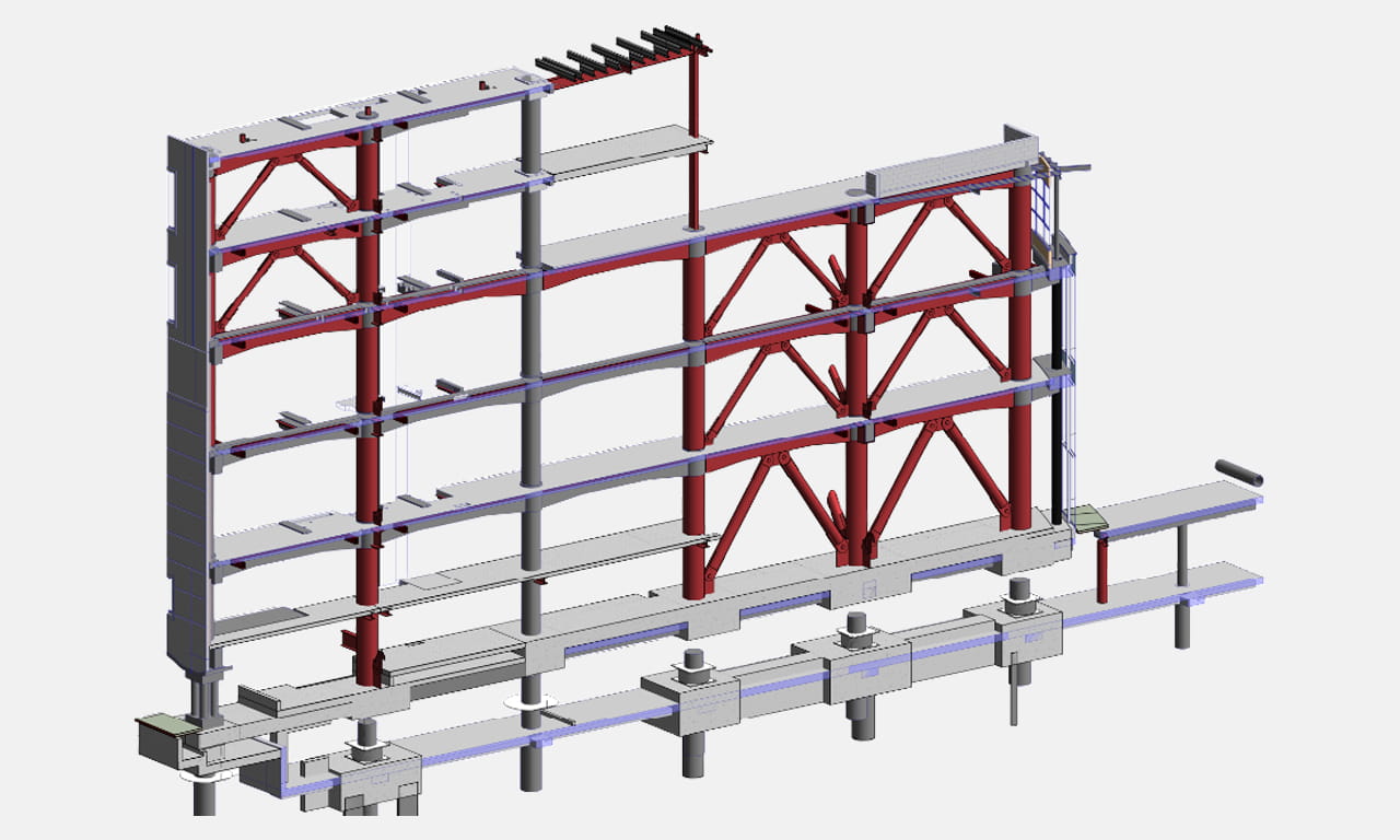 Our solution combining a hybrid base isolation system with new steel braced frames fundamentally altered the building's seismic response, increasing the buildings stiffness which reduced the scope of strengthening.