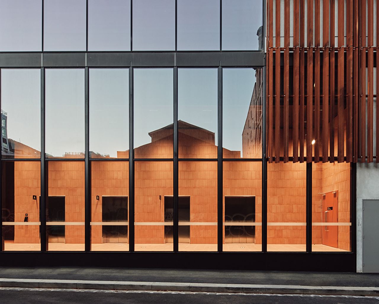 Double-glazed facade glass, operable windows deliver on the sustainability strategies for the site. Courtesy of Impact Investment Group.