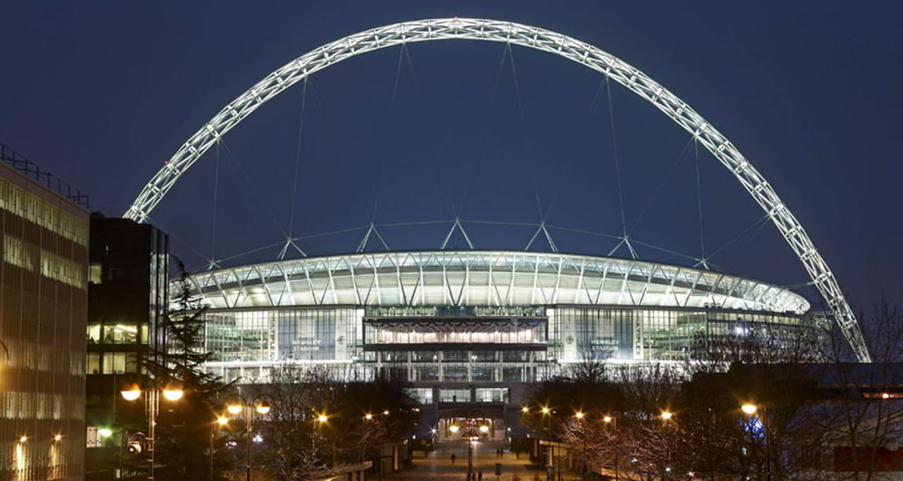 A close up of Wembley Stadium at night. Image courtesy of Nigel Young/Foster + Partners.