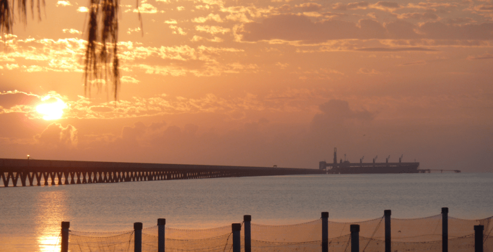 Looking out over the water to the Lucinda Bulk Sugar Terminal.